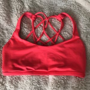 Coral color sports bra